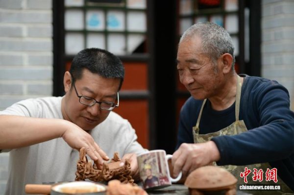 盈富优配 文化中国行｜一方澄泥天鹅砚 千载古艺时尚风